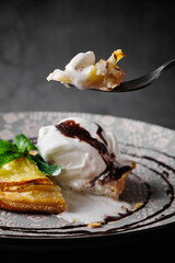 Delicious dessert with ice cream and chocolate sauce