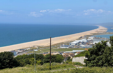 Chesil beach stretching westwards from high up on Portland, Dorset UK.