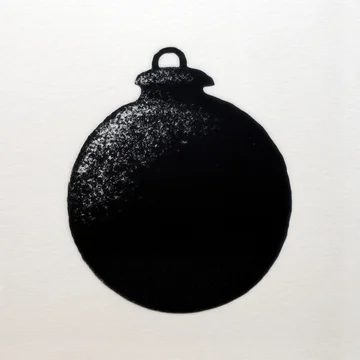 Minimalist Black Christmas Ball Silhouette on White Paper.