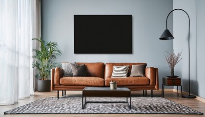 modern living room with brown leather sofa and black picture on the wall