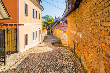 Charming old cobbled stone street in the historic old town of Ptuj, Slovenia