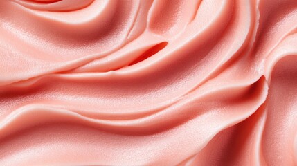 Obraz premium Close-up of pink frosting swirls, texture, background