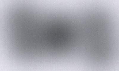 A blurry gray and white abstract background with subtle gradients and soft light variations across surface