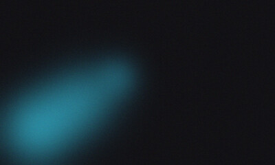 A blurry teal light shines against a dark background creating a soft and mysterious atmosphere effect