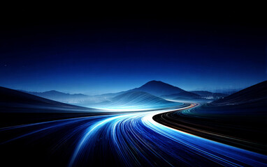 Dynamic blue light trails on a winding road in a dark mountainous landscape