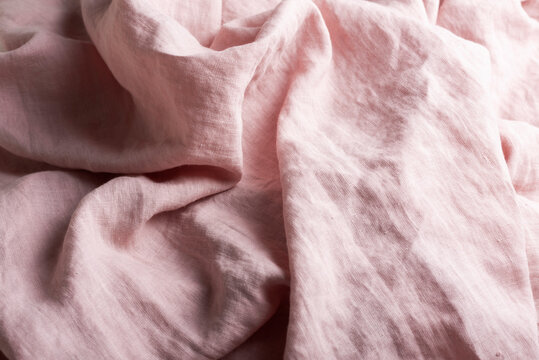 Sewing concept with pink linen fabric