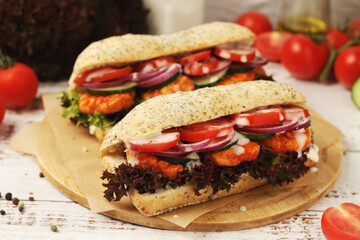 Baguette sandwiches with chicken and fresh vegetables	
