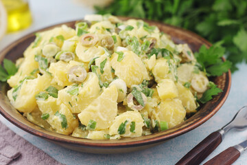 A bowl with Greek potato salads
