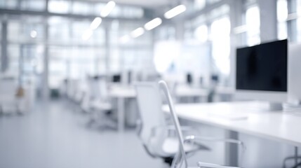 ambient. Abstract blurred modern office space with clean lines, suggesting a professional workspace. real-estate listings.
