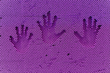 Captivating close-up showcases a vibrant violet pin impression toy against an isolated in white background. The dimensional surface creates a dynamic textured pattern and visual depth.