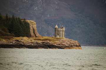 Lighthouse Tower on Rocky Scottish Coastline
