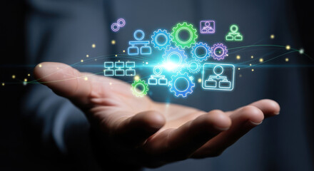 A hand holding glowing digital icons representing business processes and technological connections.