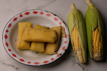 Lepet Jagung. Corn lepet is a typical Indonesian snack made from sweet corn and shredded coconut. 
