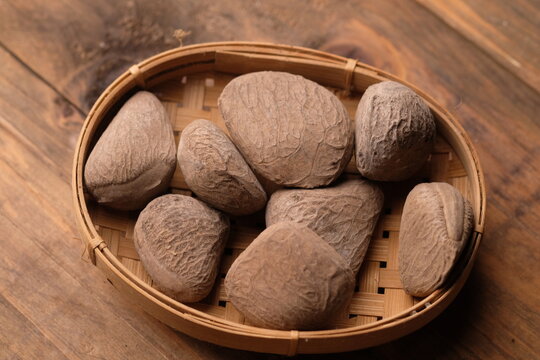 Kepayang, pangi, or kaloa is a tree that grows wild or is planted in gardens, which produces a cooking spice known as keluak. Pangium edule