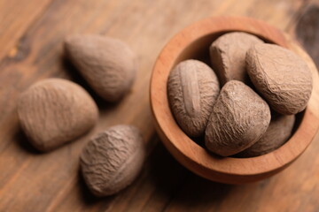 Kepayang, pangi, or kaloa is a tree that grows wild or is planted in gardens, which produces a cooking spice known as keluak. Pangium edule. Kluwak nut. 