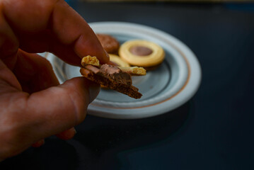 When you hold the biscuit called Noblice in your hand, you can't resist taking a bite, where you can see exactly the texture of what it's made of and you can see the two types of chocolate.