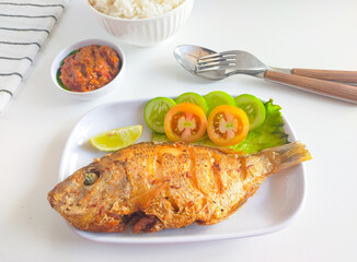 Fried fish with sambals