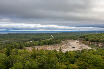 A picturesque view of the Cup and Saucer Trail on Manitoulin Island, showcasing the natural beauty and lush greenery of Ontario's iconic hiking destination.