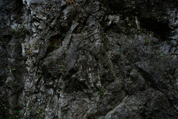 Dark rocky cliff stone texture