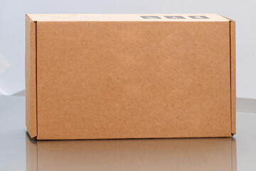 Cardboard box with handling and storage safety labels