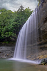 Bridal Veil Falls on Manitoulin Island offers a serene and picturesque glimpse into Ontario's natural beauty with its cascading waters and lush surroundings.