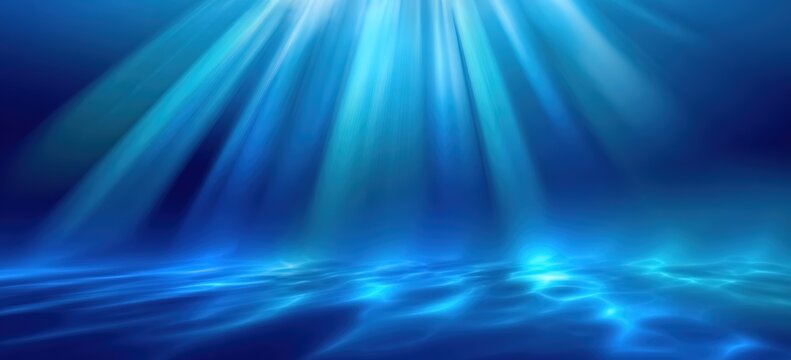 Blue Underwater Light Rays. It shows radiant blue light beams piercing through water. Great for underwater - themed designs, aquatic event backdrops, or relaxation - focused media.
