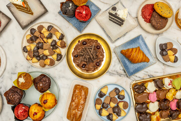 Photograph of a deep dark chocolate cheesecake, with a silky smooth texture and decorated with chocolate shavings and fresh raspberries