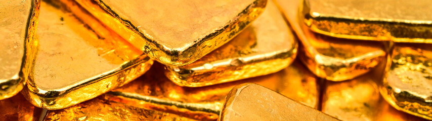 Close up photo a gold bars background, banner side