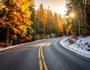 Fototapeta premium serene winding road through a forest, warm glow of sunlight, autumn foliage, hint of snow