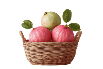 Vibrant pink guavas in woven basket with leaves isolated on black, cut out