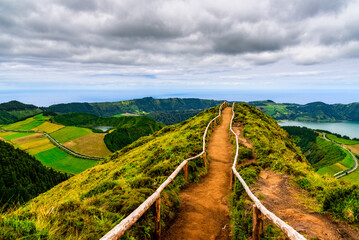 Hiking trail leading to a breathtaking view in Sao Miguel Island, Azores, Portugal