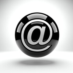 Glossy black sphere with a silver at symbol, representing email or online communication