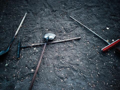 Working tools on the clean ground backdrop