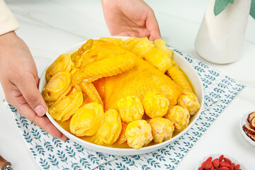 Traditional Abalone Soup with Gelatin Flower Ingredients in White Bowl - Asian Cuisine Cooking Preparation