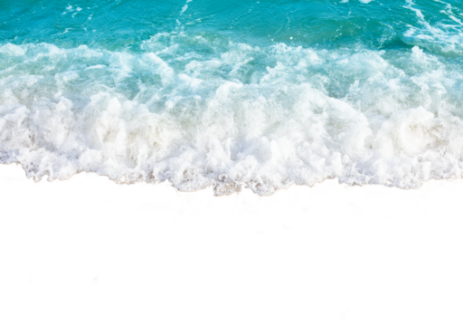 Waves crashing on sandy beach with foamy water creating dynamic and refreshing scene