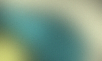 Abstract blurred background featuring a gradient of blue green and beige color with soft transitions