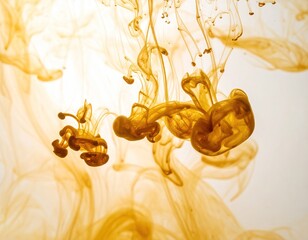 Amber Ink Tendrils Intertwining in Water