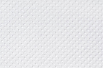 Texture of white paper towel with three-dimensional texture. Macro.
