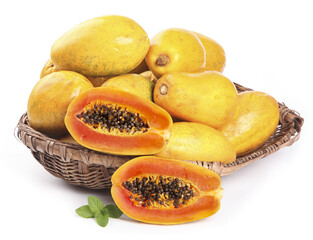 Fresh Papaya Fruits in Wicker Basket with Cut Halves on White Background