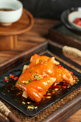 Braised Pork Feet in Soy Sauce Glaze - Traditional Asian Gourmet Dish on Wooden Table