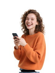 Fototapeta premium Smiling girl in orange sweater types on phone. PNG, transparent background. Great for social media or product staging.