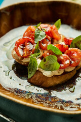 Close-up of bruschetta with tomatoes and basil
