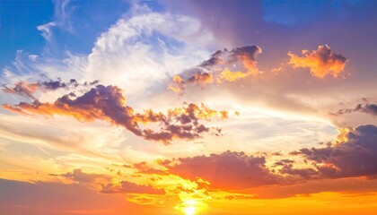 Dramatic Golden Sunset with Cumulus Clouds against a Vivid Blue Sky with Rays of Sunlight Creating a Warm and Hopeful Atmosphere at Golden Hour