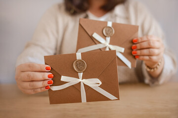 Gift Voucher Certificates on woman hands, discounts for regular customers