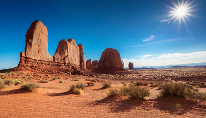Majestic Stone Monoliths Under Bright Blue Sky In Desert Landscape
