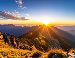 Golden Sunrise Over Mountain Range with Jagged Peaks and Wild Grass in Foreground High Dynamic Range
