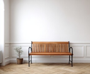 A wooden bench sits in a bright, minimalist interior space, accented by white walls and light-toned flooring.