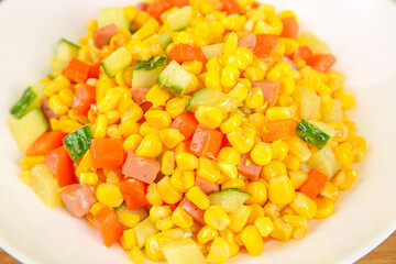Delicious Fresh Corn Salad with Mixed Vegetables on White Plate - Healthy Vegetarian Side Dish