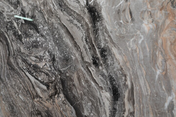 Beautiful black and gray marble surface showcasing natural patterns and textures from a close-up view