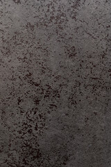 Textured dark surface with unique patterns perfect for backgrounds and design projects